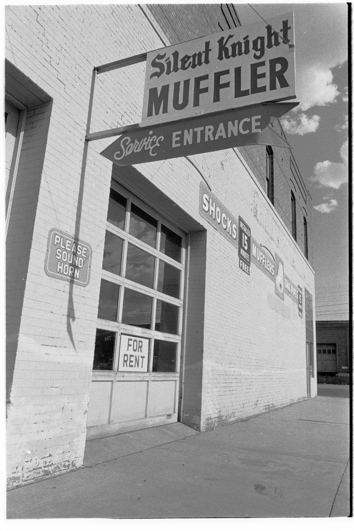 Silent Knight Muffler Service, 1975